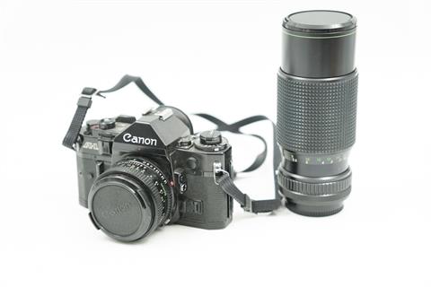 1 SLR-Kamera "Canon", 2 Objektive